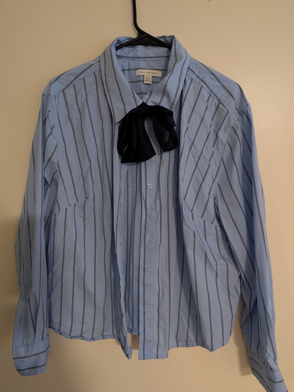 Light Blue Striped Button-Up Shirt with Dark Blue Bow